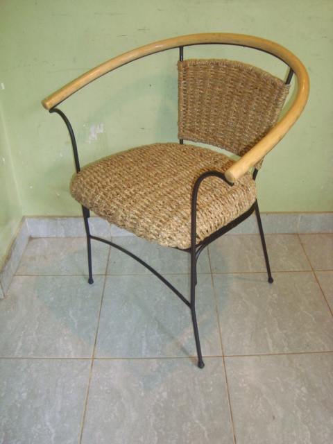 Reed arm chair with wooden armrests